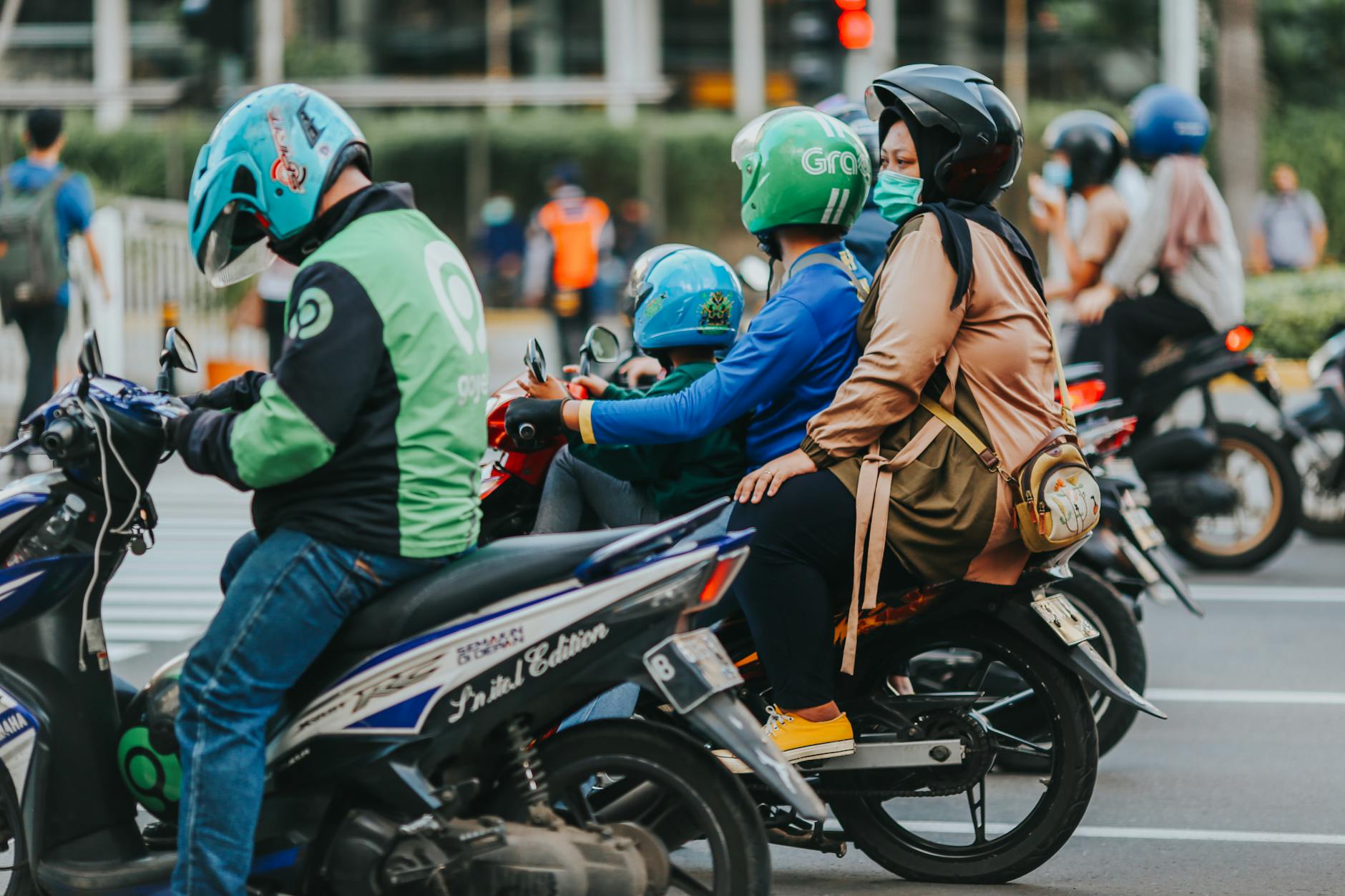 family on a motorcycle in a street