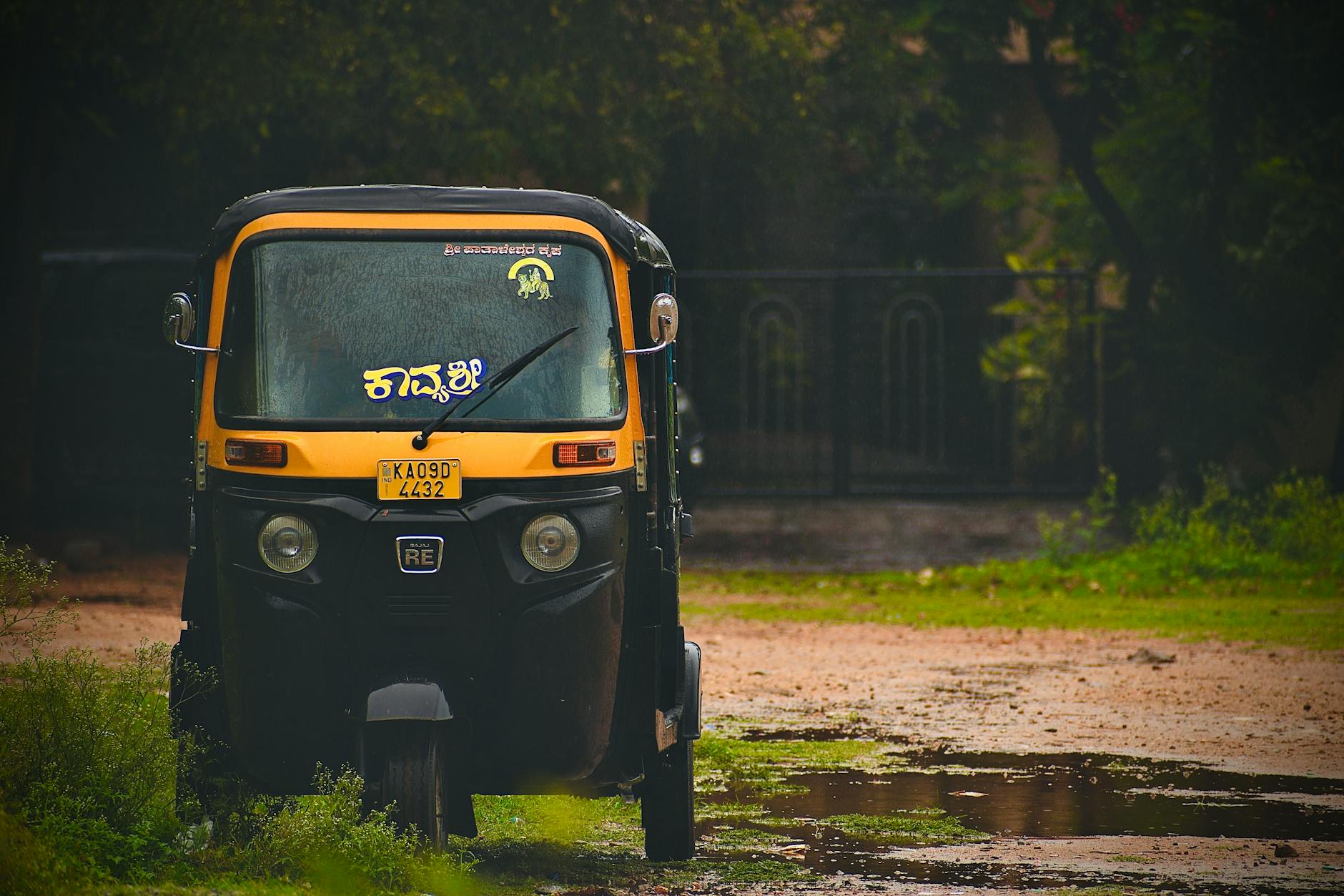 a tricycle under the rain